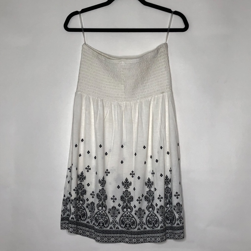 Cream strapless shirred tunic top w/black design